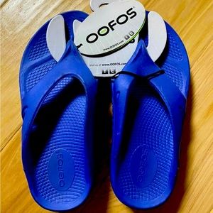 Oofos flip flops, brand new, purchased in Hawaii but didn’t fit our daughter.